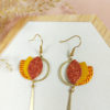 Boucles d'oreilles en cuir orange pailleté