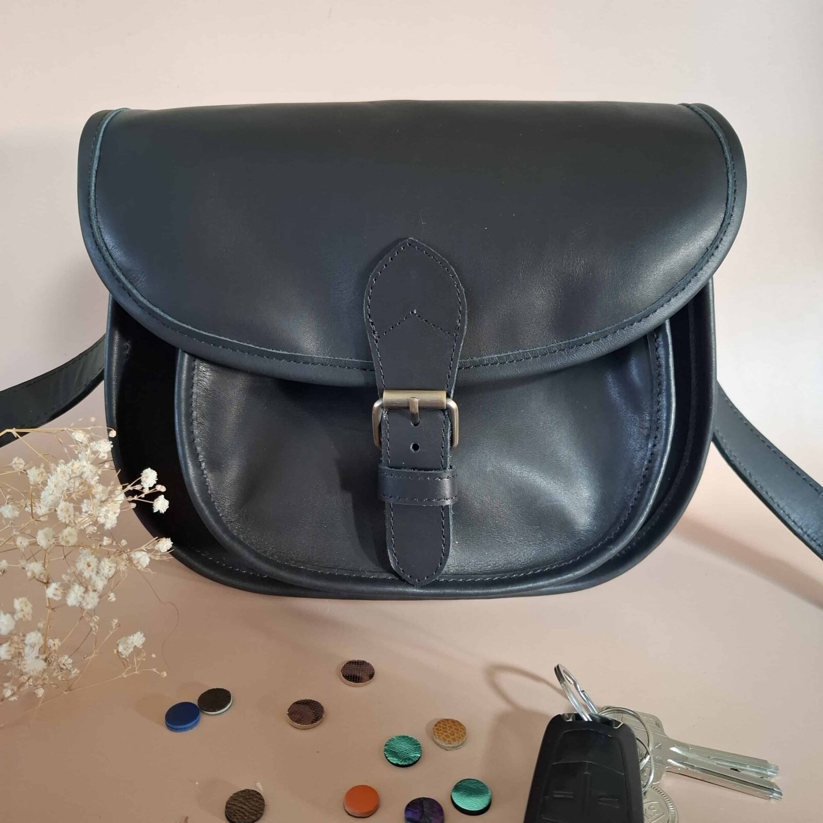 sac besace noir en cuir